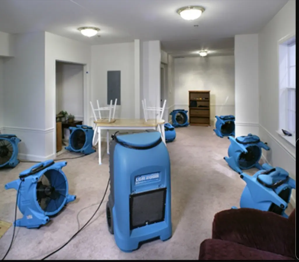 Air movers and dehumidifier setup for Water Extraction & Removal in Clarkson